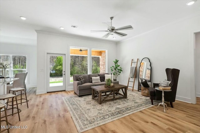 213 Dolly Ln, Magee, MS 39111 - living area featuring a ceiling fan, ornamental molding, light wood-style floors, baseboards, and recessed lighting