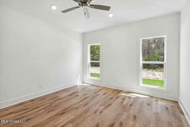 213 Dolly Ln, Magee, MS 39111 - unfurnished room featuring light wood-style floors, baseboards, ceiling fan, and recessed lighting