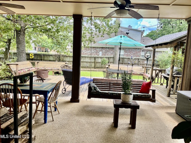 1024 Riverchase N Dr, Brandon, MS 39047 - fenced backyard featuring ceiling fan, a deck, and area for grilling