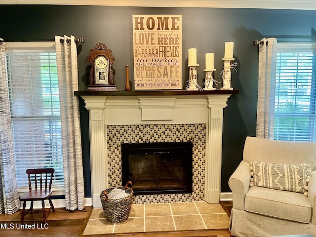 1024 Riverchase N Dr, Brandon, MS 39047 - living room featuring a tile fireplace and wood finished floors