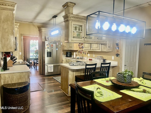 1024 Riverchase N Dr, Brandon, MS 39047 - kitchen featuring stainless steel fridge, cream cabinetry, light countertops, a peninsula, and ornamental molding