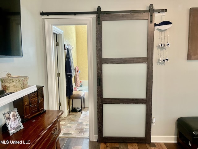 1024 Riverchase N Dr, Brandon, MS 39047 - hallway featuring a barn door