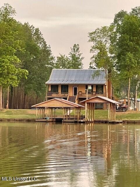 view of dock with a water view