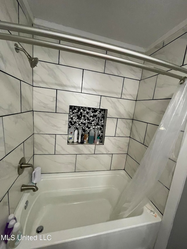 bathroom featuring shower / tub combo with curtain