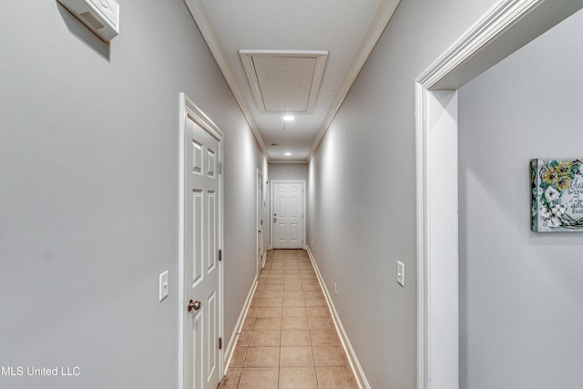 corridor featuring light tile patterned floors