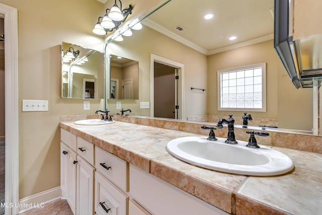 bathroom with vanity, tile patterned floors, and crown molding