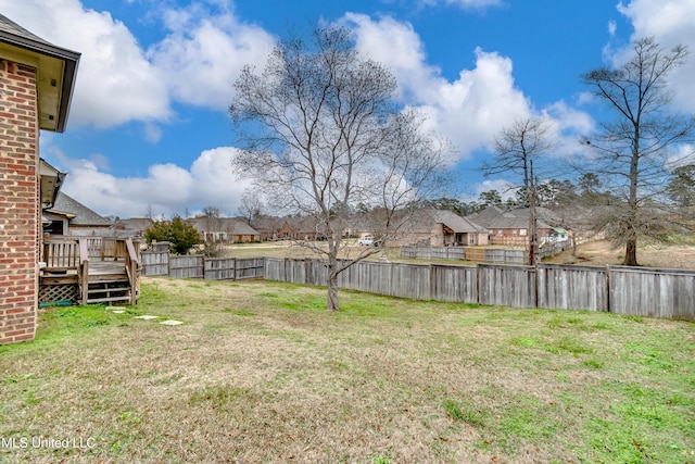 view of yard featuring a deck