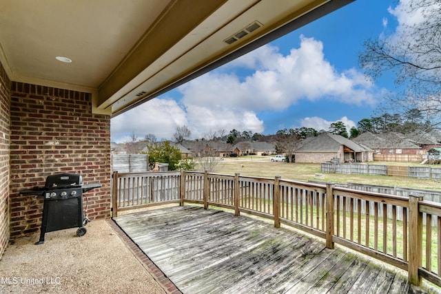 537 Turtle Ln, Brandon, MS 39047 - wooden terrace with area for grilling and a residential view
