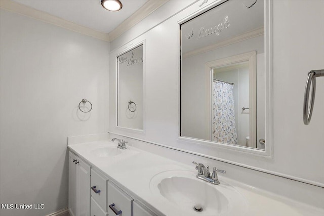 bathroom featuring vanity and crown molding