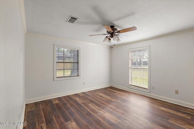 unfurnished room with ceiling fan, a textured ceiling, dark hardwood / wood-style flooring, and ornamental molding