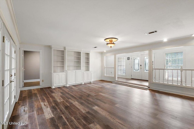 entryway featuring crown molding and dark hardwood / wood-style flooring