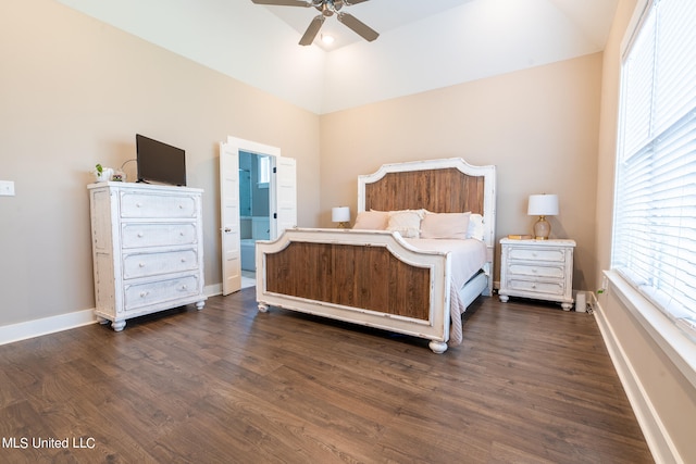 bedroom featuring ceiling fan, dark hardwood / wood-style flooring, and ensuite bath