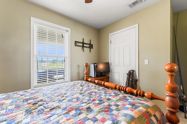 bedroom featuring visible vents and a ceiling fan