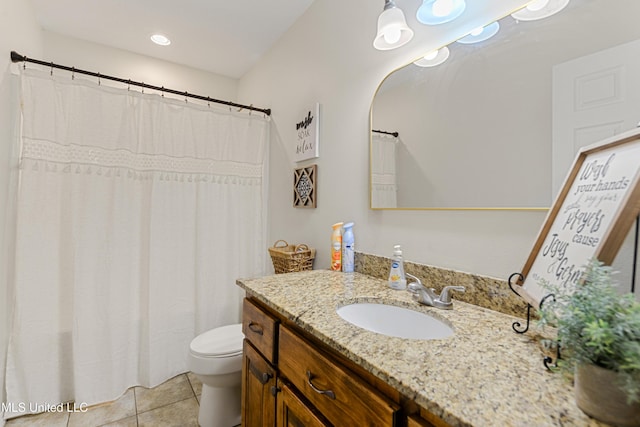 full bathroom with tile patterned floors, toilet, and vanity