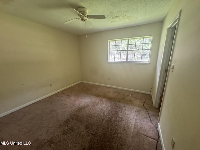 2318 Breckinridge Rd, Jackson, MS 39204 - empty room featuring carpet flooring, a ceiling fan, and a textured ceiling