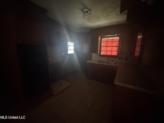 2318 Breckinridge Rd, Jackson, MS 39204 - bathroom with a sink and tile patterned floors
