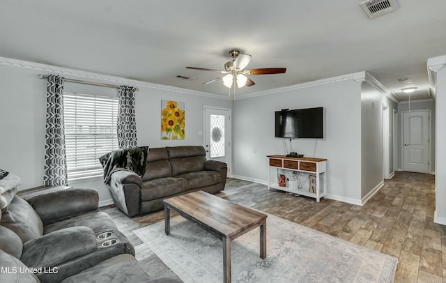 living room featuring crown molding, hardwood / wood-style flooring, and ceiling fan