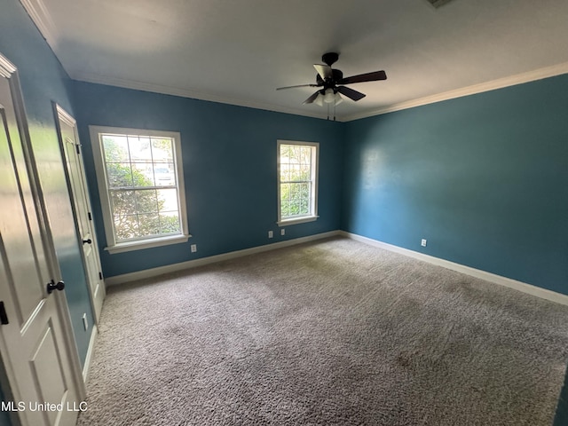 314 Fox Holw, Canton, MS 39046 - carpeted empty room with a ceiling fan, baseboards, and crown molding