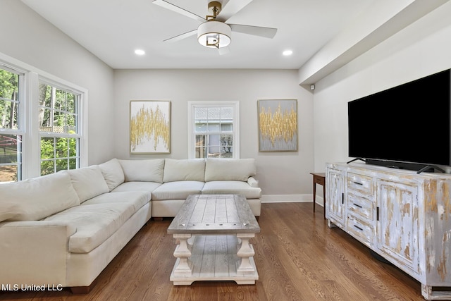 living room featuring ceiling fan, recessed lighting, dark wood finished floors, and baseboards