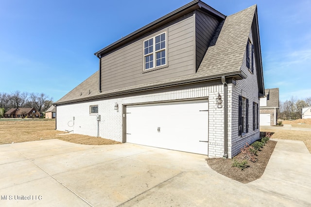 view of property exterior with a garage