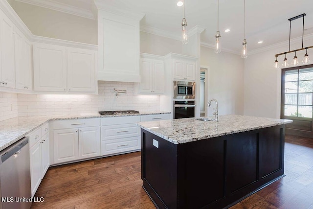 132 Freeland Ln, Clinton, MS 39056 - kitchen featuring appliances with stainless steel finishes, tasteful backsplash, white cabinetry, ornamental molding, and recessed lighting