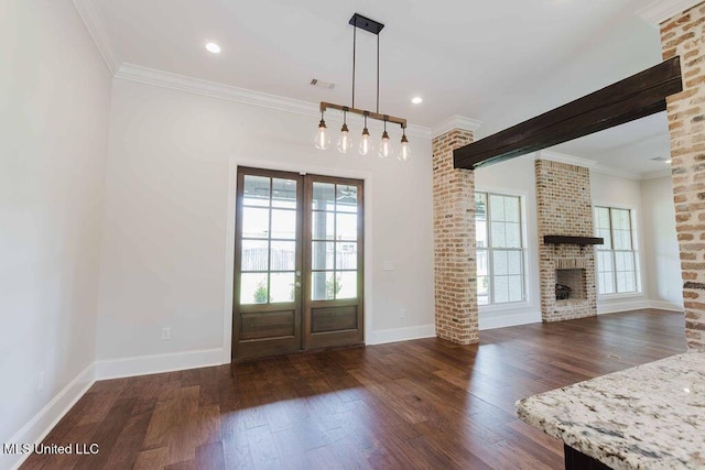 132 Freeland Ln, Clinton, MS 39056 - foyer entrance featuring plenty of natural light, hardwood / wood-style floors, french doors, a fireplace, and ornamental molding