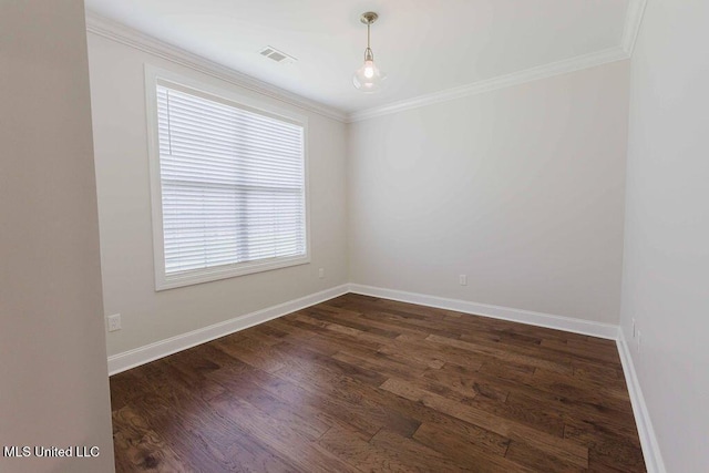 132 Freeland Ln, Clinton, MS 39056 - empty room featuring crown molding and dark wood-type flooring