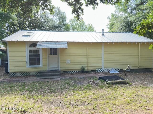 153 Saint Peter St, Biloxi, MS 39530 - view of front of house with metal roof and entry steps