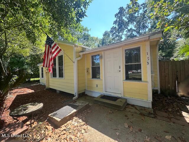 153 Saint Peter St, Biloxi, MS 39530 - view of outdoor structure with fence and entry steps