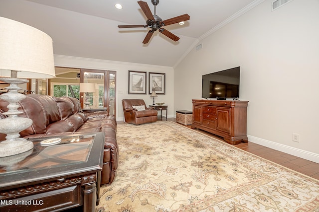 living area with vaulted ceiling, crown molding, a ceiling fan, baseboards, and wood finished floors