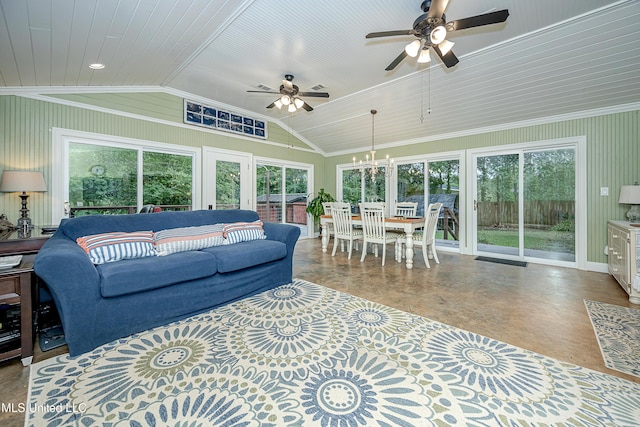 living area with vaulted ceiling, ceiling fan, a chandelier, and ornamental molding