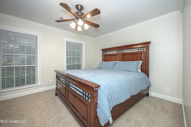 bedroom with light carpet, ornamental molding, baseboards, and a ceiling fan