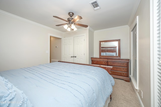 bedroom with crown molding, light colored carpet, and ceiling fan