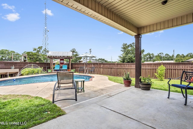 3841 Chateau Cv, Ocean Springs, MS 39564 - fenced backyard with a gazebo and a patio