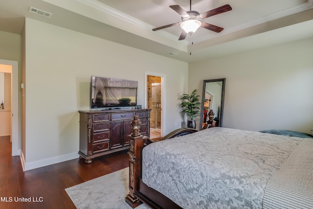 3936 David Ln, Diberville, MS 39540 - bedroom featuring dark wood-style flooring, crown molding, baseboards, a ceiling fan, and a tray ceiling