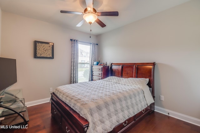 3936 David Ln, Diberville, MS 39540 - bedroom with baseboards, dark wood-type flooring, and a ceiling fan