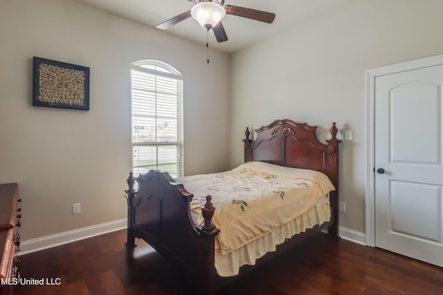 3936 David Ln, Diberville, MS 39540 - bedroom featuring wood finished floors, baseboards, and a ceiling fan