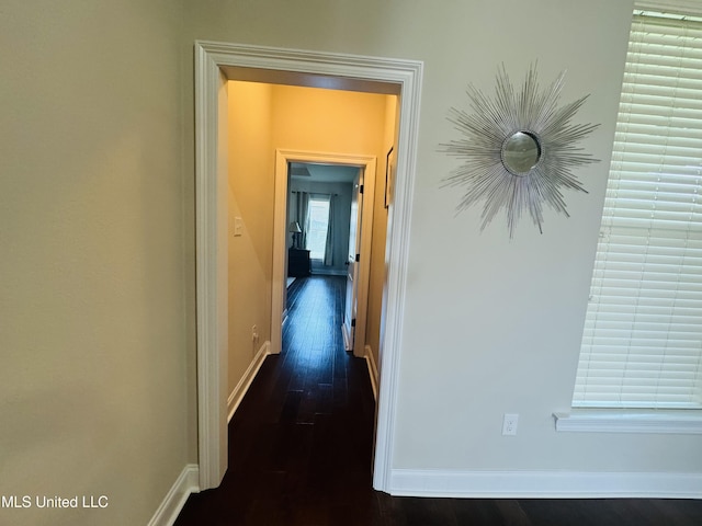 3936 David Ln, Diberville, MS 39540 - corridor featuring dark wood-type flooring and baseboards