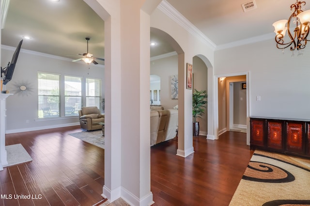 3936 David Ln, Diberville, MS 39540 - entryway featuring a ceiling fan, ornamental molding, wood finished floors, arched walkways, and baseboards