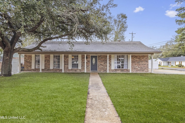 ranch-style home with a front lawn