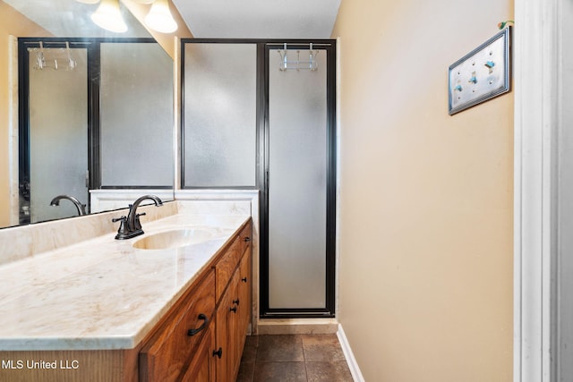 530 Oakhurst Dr, Hernando, MS 38632 - full bath with vanity, a shower stall, and tile patterned flooring