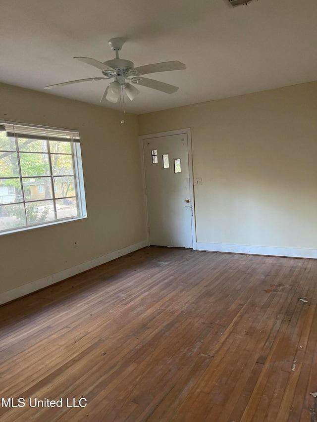 entrance foyer featuring ceiling fan and hardwood / wood-style floors