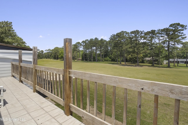 deck featuring a yard