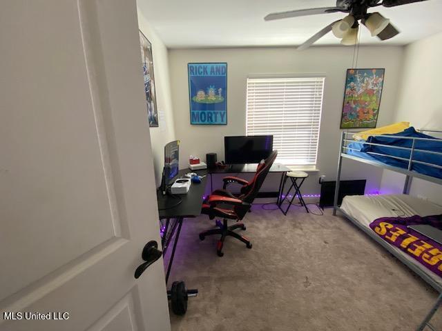 carpeted bedroom with ceiling fan