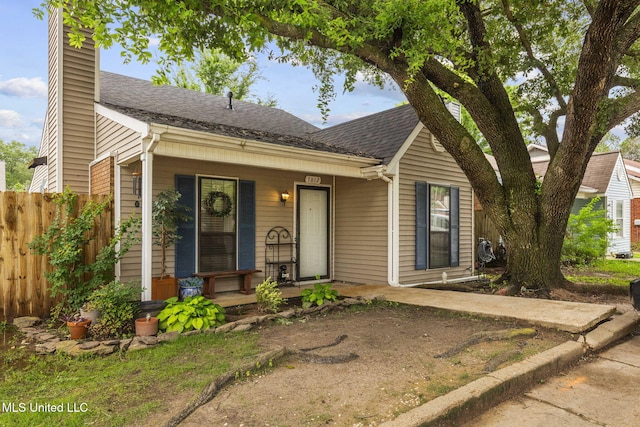 7012 Copper Cv, Ridgeland, MS 39157 - bungalow-style house featuring a porch, a chimney, and a shingled roof