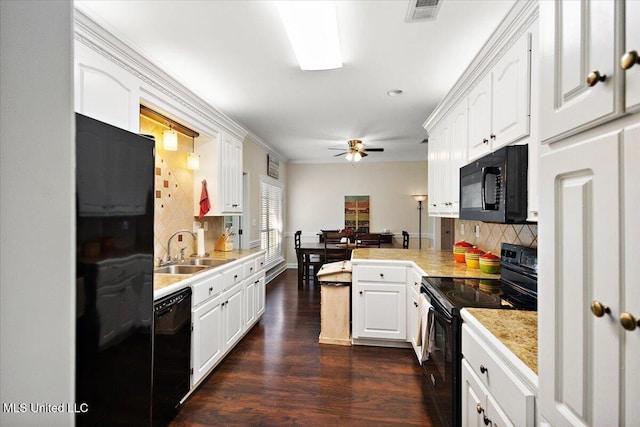205 Stonebriar Ln, Brandon, MS 39042 - kitchen with black appliances, white cabinetry, decorative backsplash, a ceiling fan, and dark wood finished floors