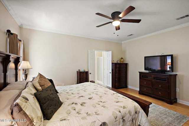 205 Stonebriar Ln, Brandon, MS 39042 - bedroom featuring wood finished floors, crown molding, and a ceiling fan