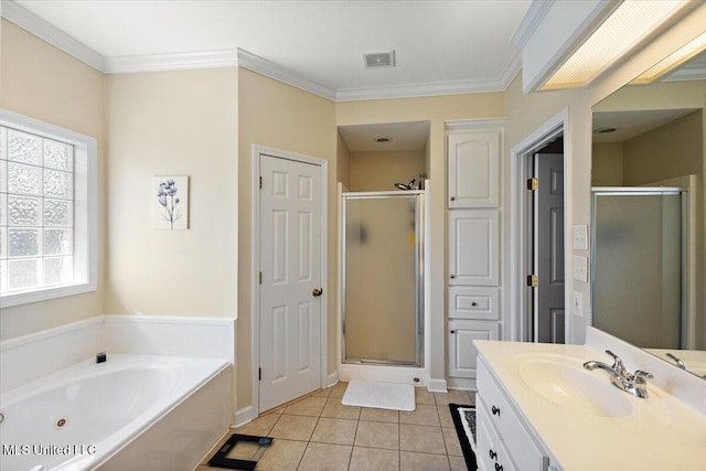 205 Stonebriar Ln, Brandon, MS 39042 - bathroom with vanity, a stall shower, a whirlpool tub, tile patterned floors, and crown molding