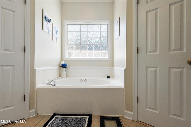 205 Stonebriar Ln, Brandon, MS 39042 - bathroom with a bath and tile patterned flooring