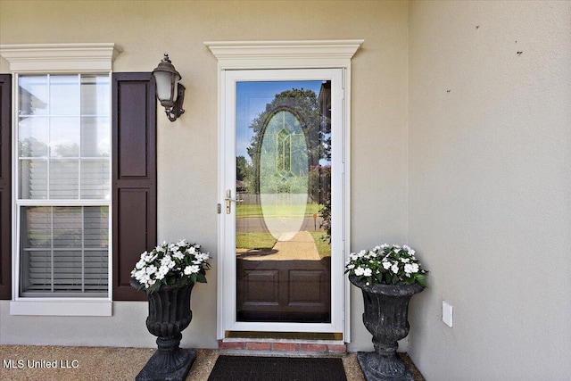 205 Stonebriar Ln, Brandon, MS 39042 - doorway to property featuring stucco siding